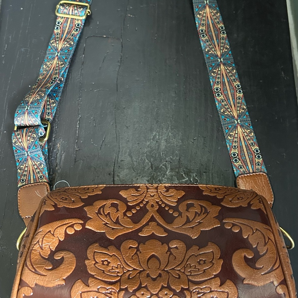 Brown Embossed Leather Bag with Patterned Strap